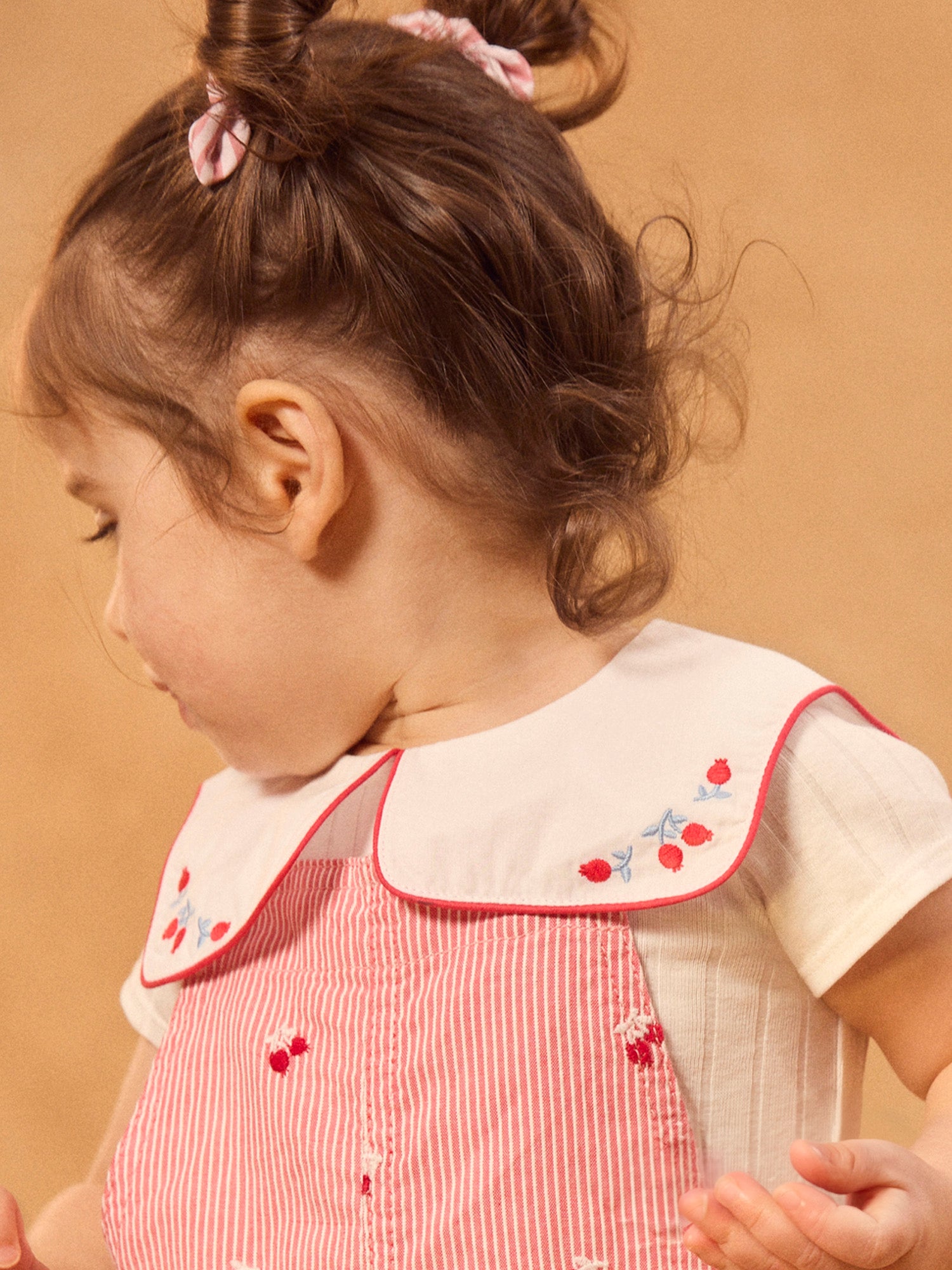 Red striped short dungarees with Baies embroidery Baby Girl