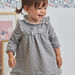 Baby girl's mottled grey jacquard dress with polka dots and ruffle details