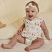 White cotton sateen romper and headband with fruit and flower print, birth girl