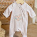 Birth girl pale pink romper and bonnet