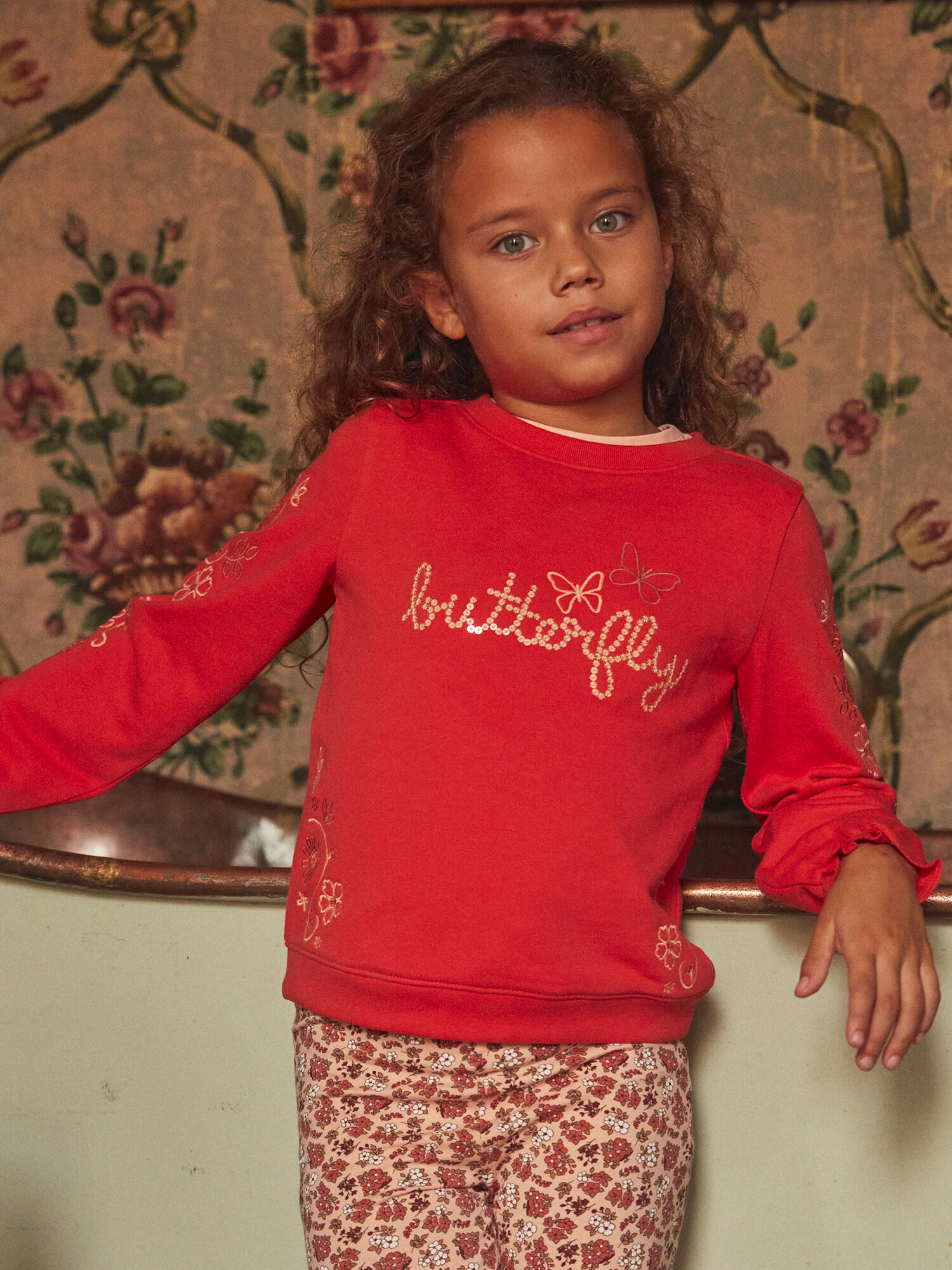Girl in sale red sweatshirt
