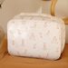 Birth suitcase in off white tubique with giraffe print