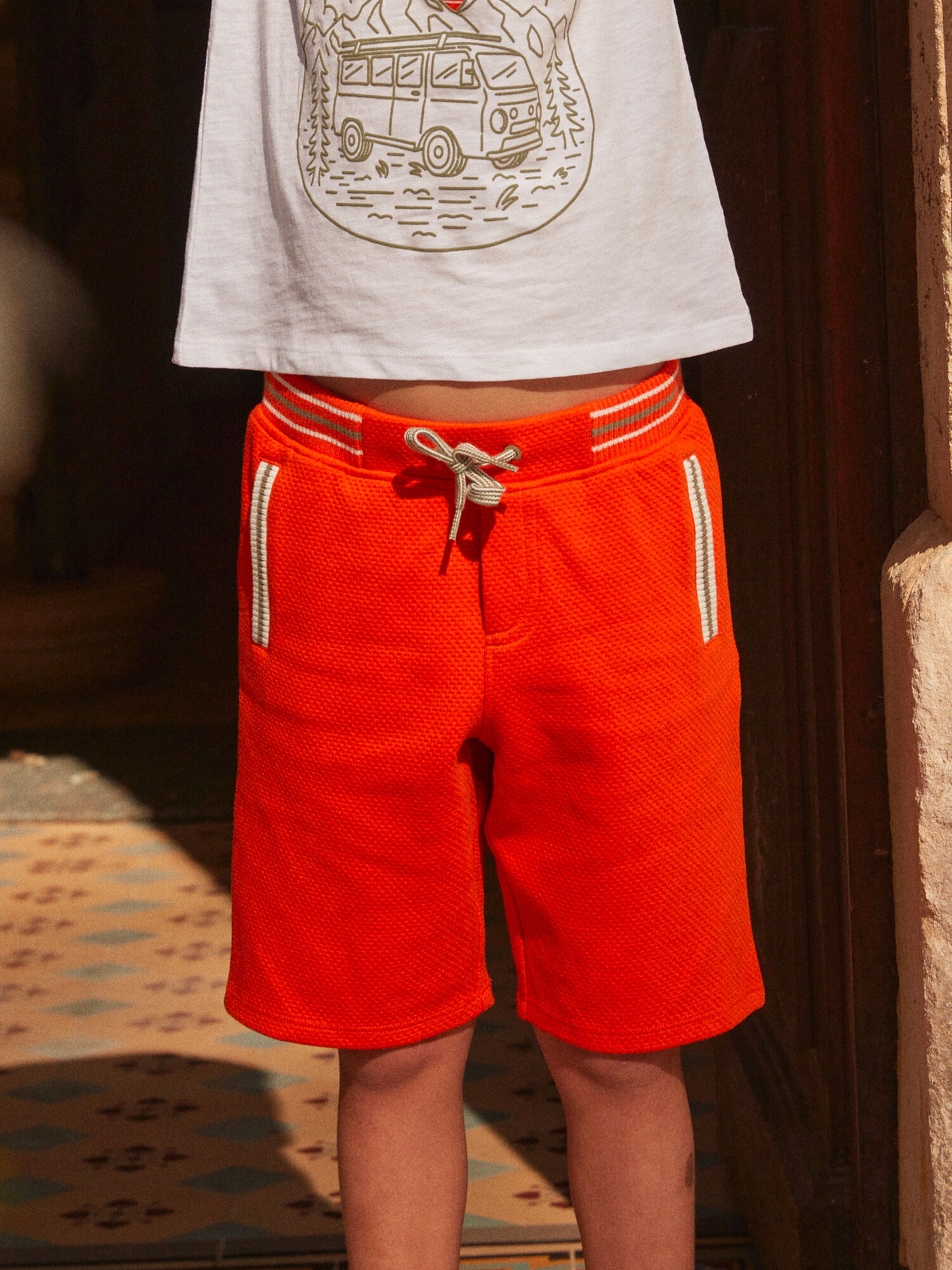 Orange top bermuda shorts