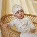 White printed romper and bonnet birth mixed
