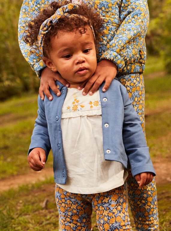 Off white blouse with leggings and floral headband 23E1BF81ENS001