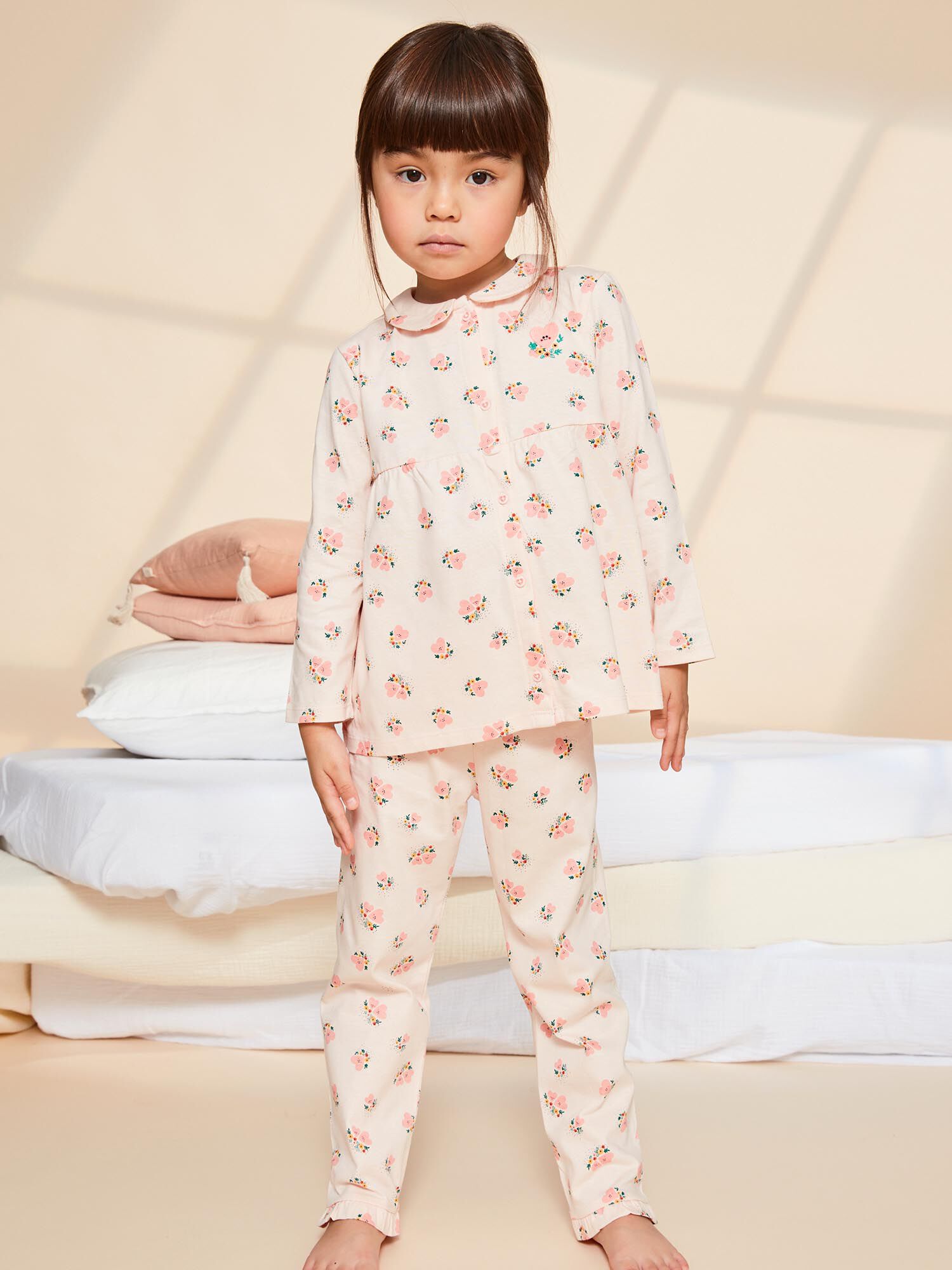 Pale pink pajama set with heart and flower print