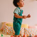 Baby boy green twill short overalls with elephant print