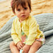 Baby girl pastel yellow bow and polka dot animation cardigan