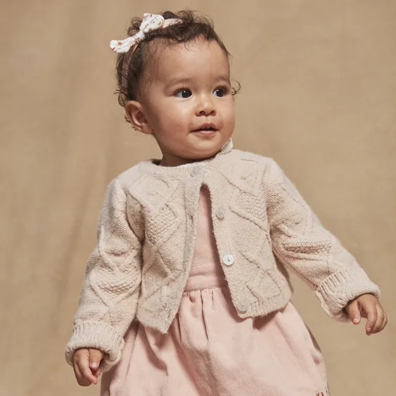 Clothing company has little girls model in child's lingerie line